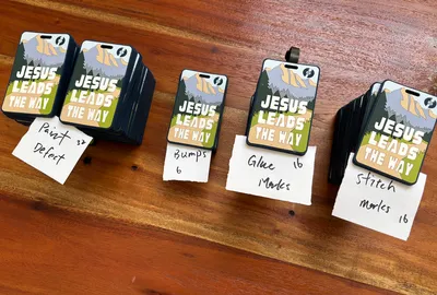 2D Soft PVC Luggage Tags - Praise the Lord tags Out of 100 pieces 62 have visible defects or issuesJesus Lead the Way tags Out of 100 pieces 70 have visible defects or issuesAround these major issue  Paint defects Bumps or air bubbles Glue marks Stitch marksI already email imprint for further assistant