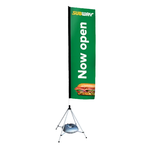 A vertical banner displaying the Subway logo and text 'Now open' with a sandwich image, mounted on a tripod stand.